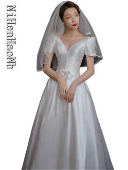 Винтажное свадебное платье из атласа трапециевидной формы с короткими рукавами и бантом с V-образным вырезом Robe De Mariée 2023